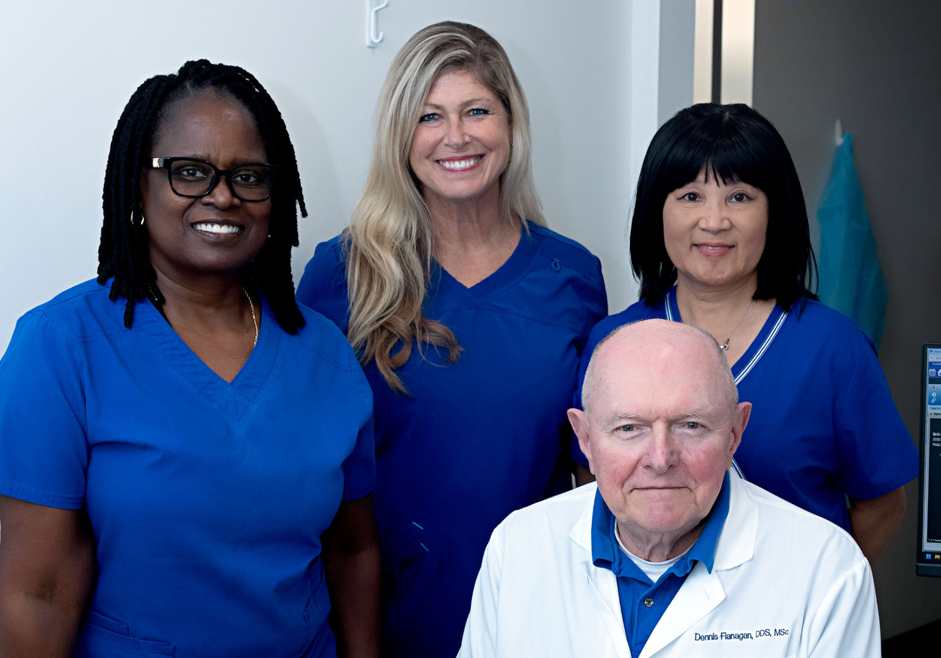 Dr. Flanagan and team posing for picture